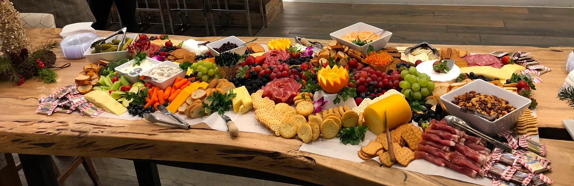 Artisanal charcuterie board with assorted cheeses and fruits