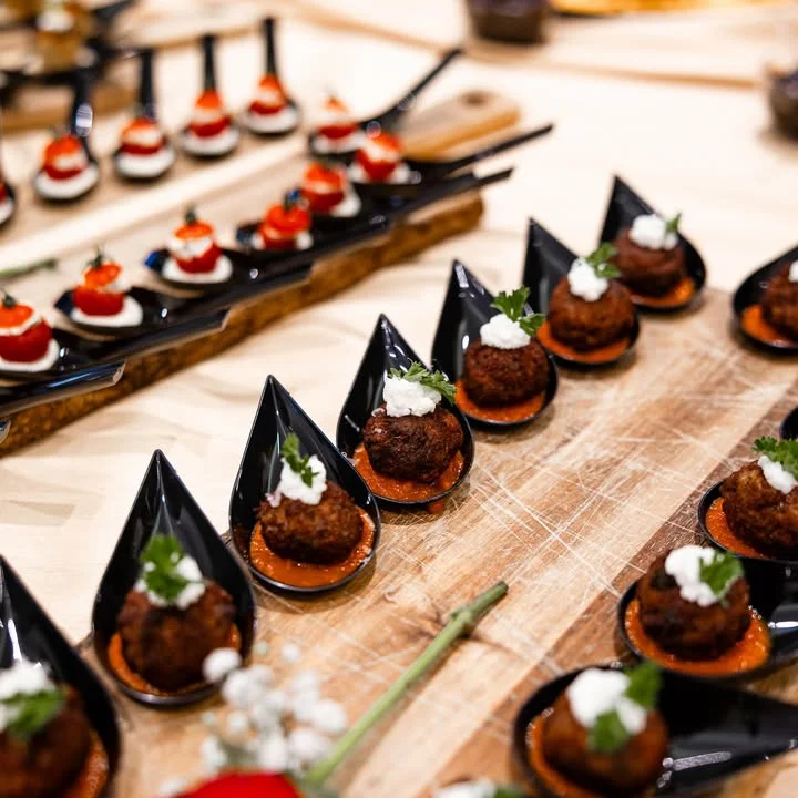 Mediterranean meatballs served in elegant black spoons