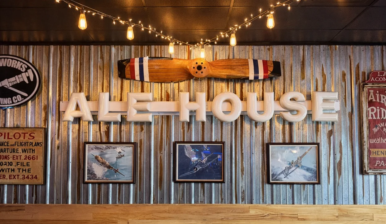 Cozy ale house interior with vintage aviation decor