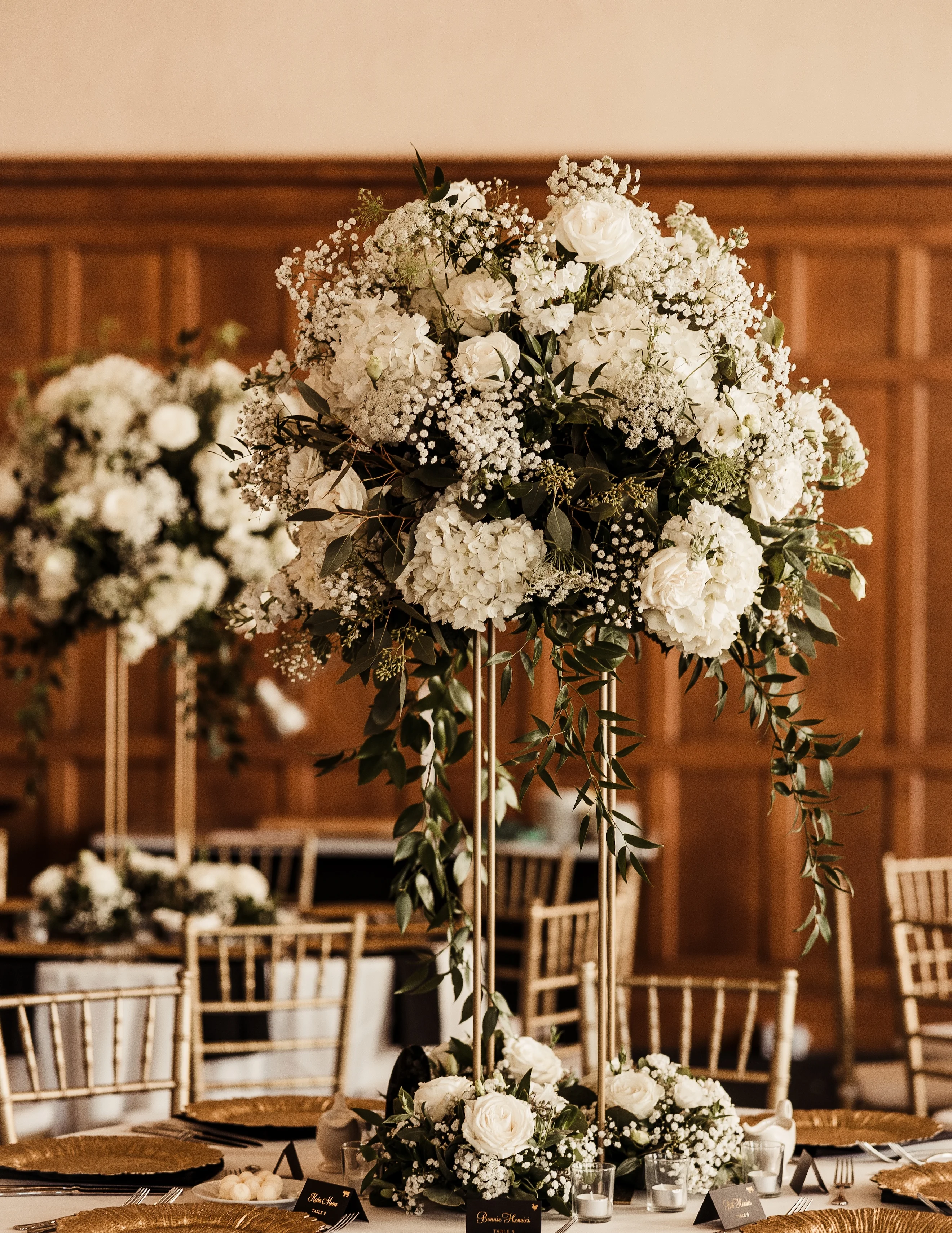 Elegant wedding table setting with floral centerpieces