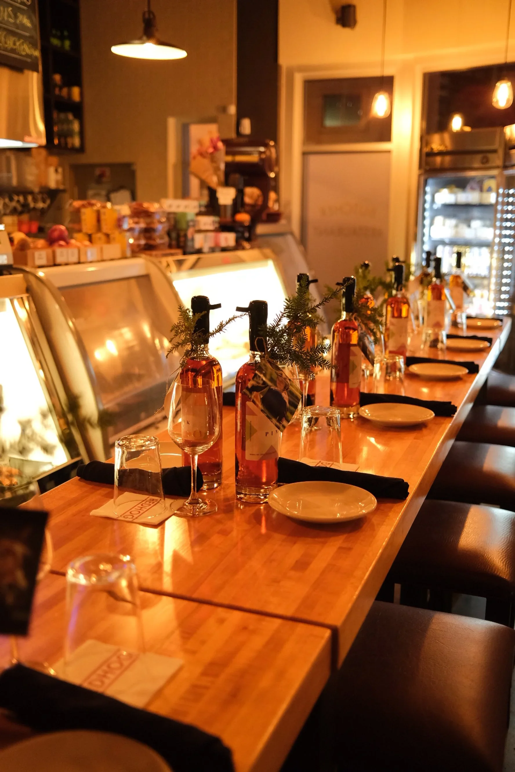 Elegant private dining room with a long table set for a special event.