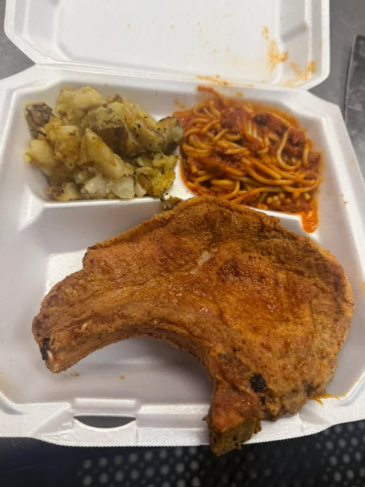 Southern-style fried pork chop with sides