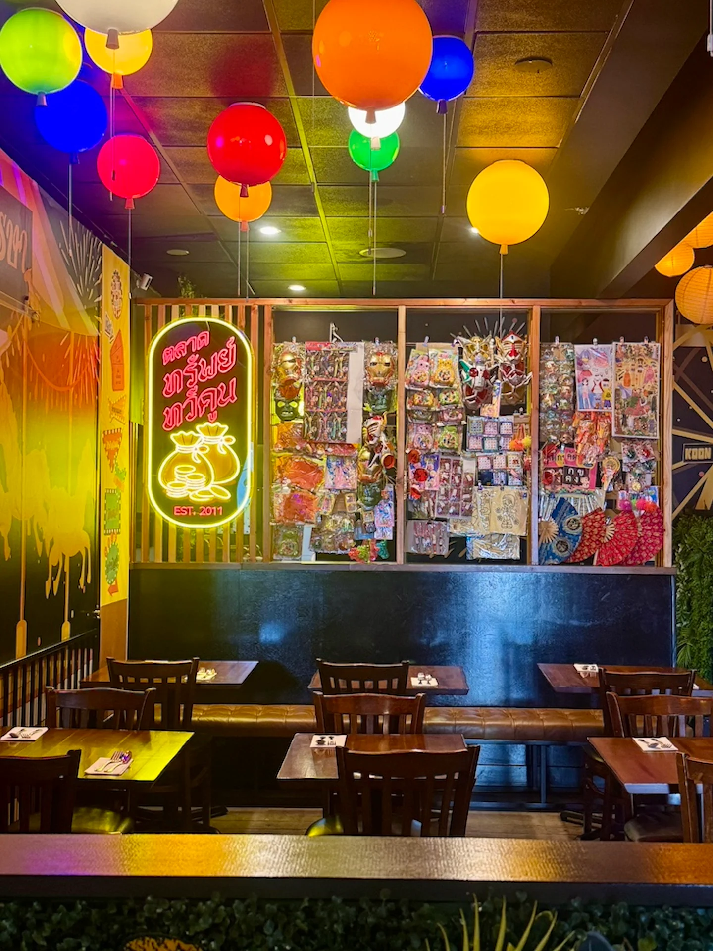 Cozy restaurant interior with wooden tables and warm lighting