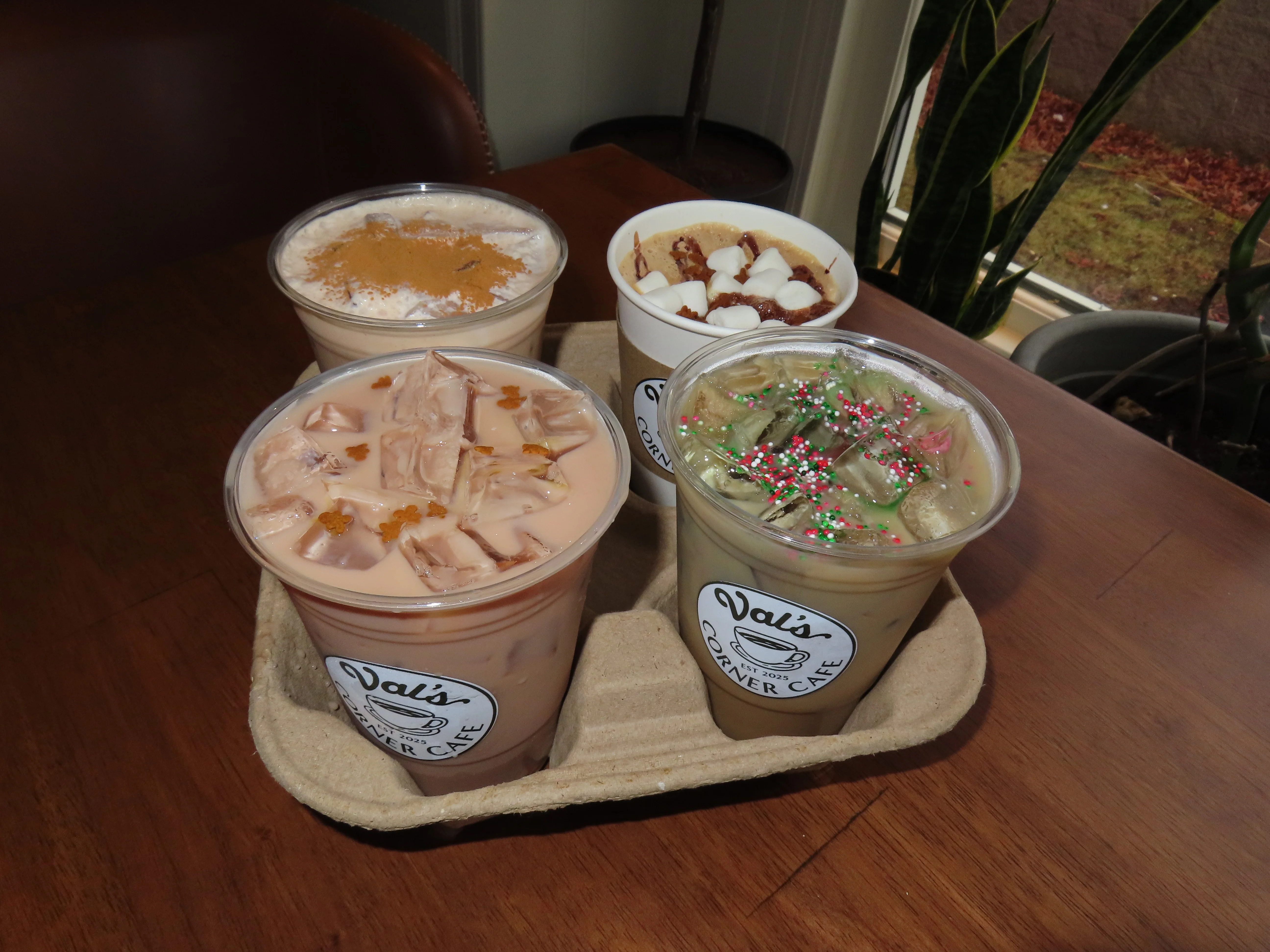 Assorted iced beverages at a cozy café