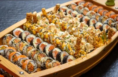 Assorted sushi platter featuring various rolls