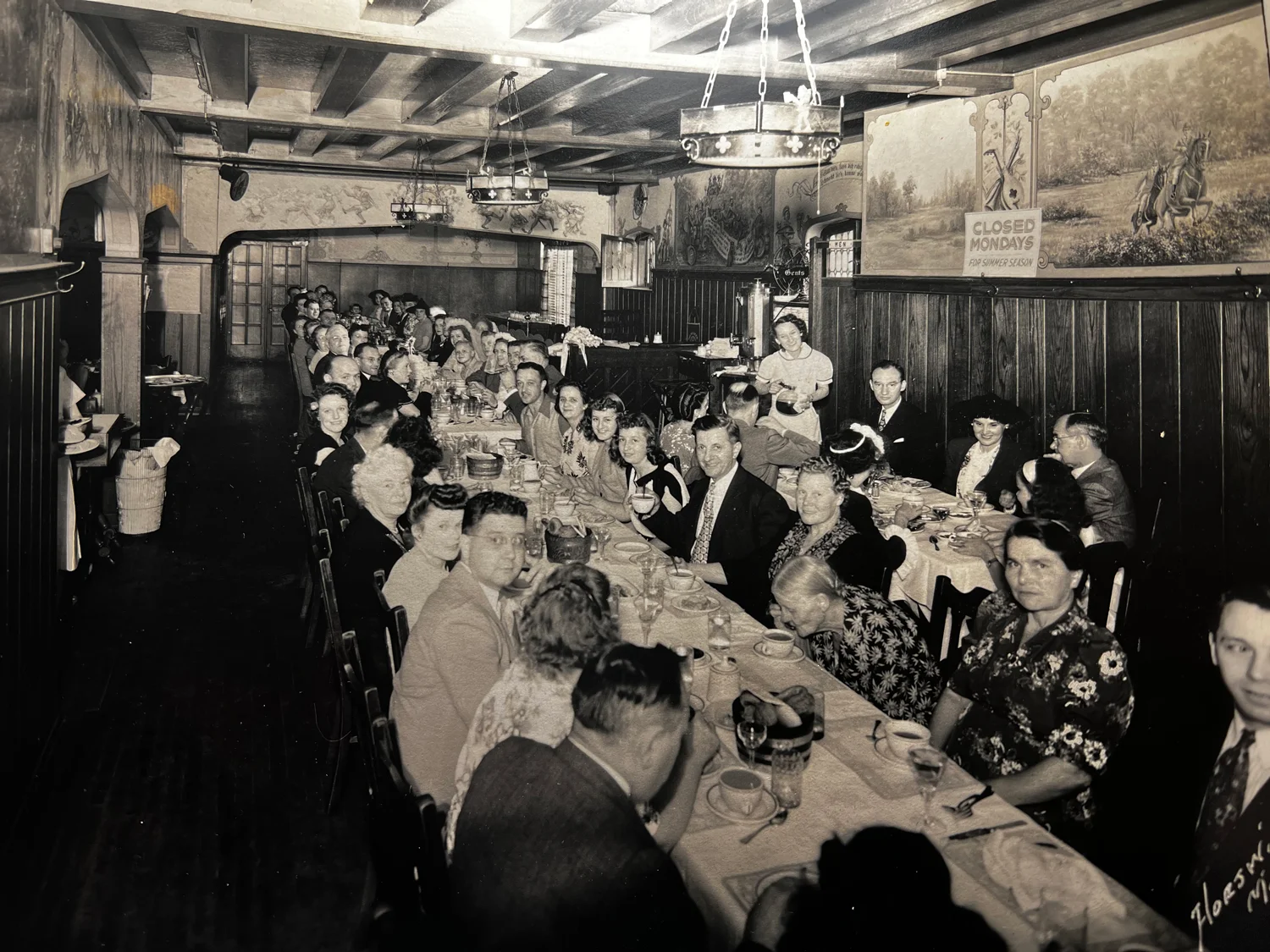 Historic restaurant dining room filled with guests
