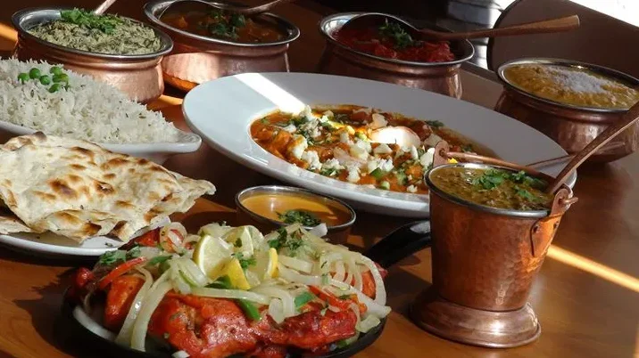 A restaurant chef preparing a dish