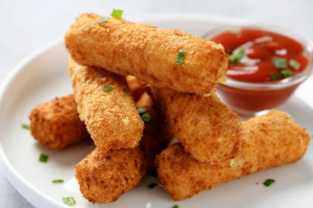 Crispy mozzarella sticks served with marinara sauce