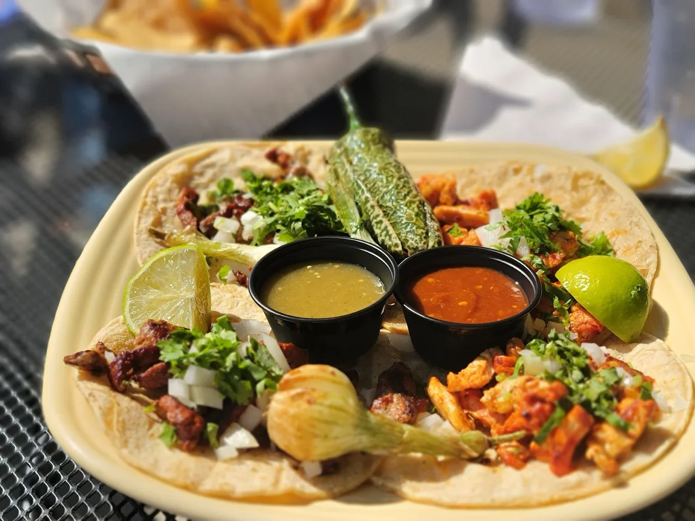 Authentic Mexican street tacos with salsa and lime
