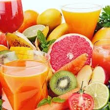 Colorful assortment of fresh fruit juices and tropical fruits