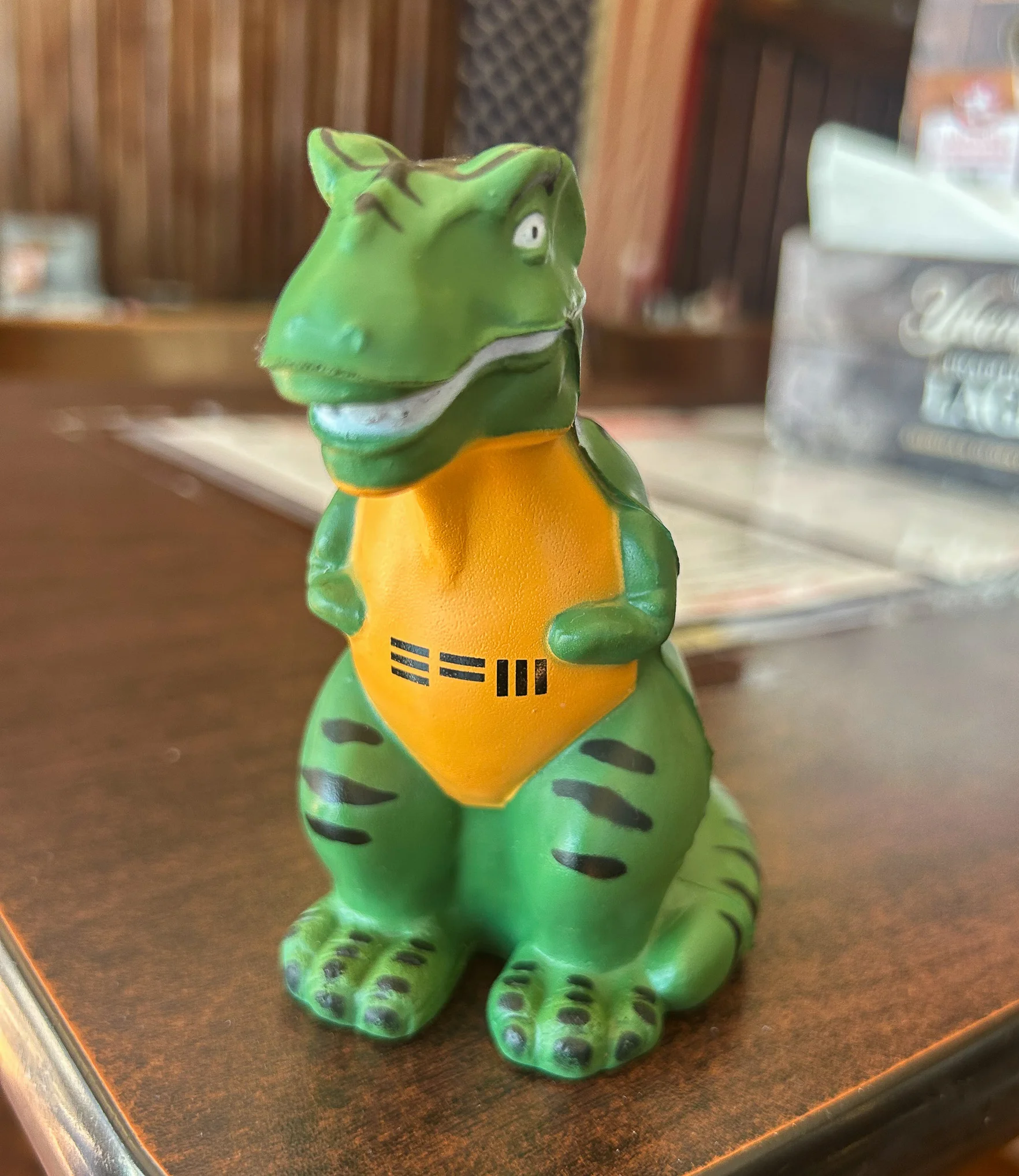 EFM Stress Ball Dino character hanging out at Steak Out Sewell