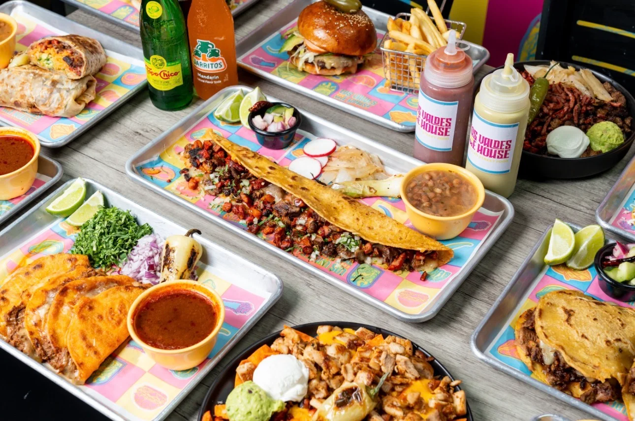 Colorful Mexican feast with tacos, burritos, and nachos