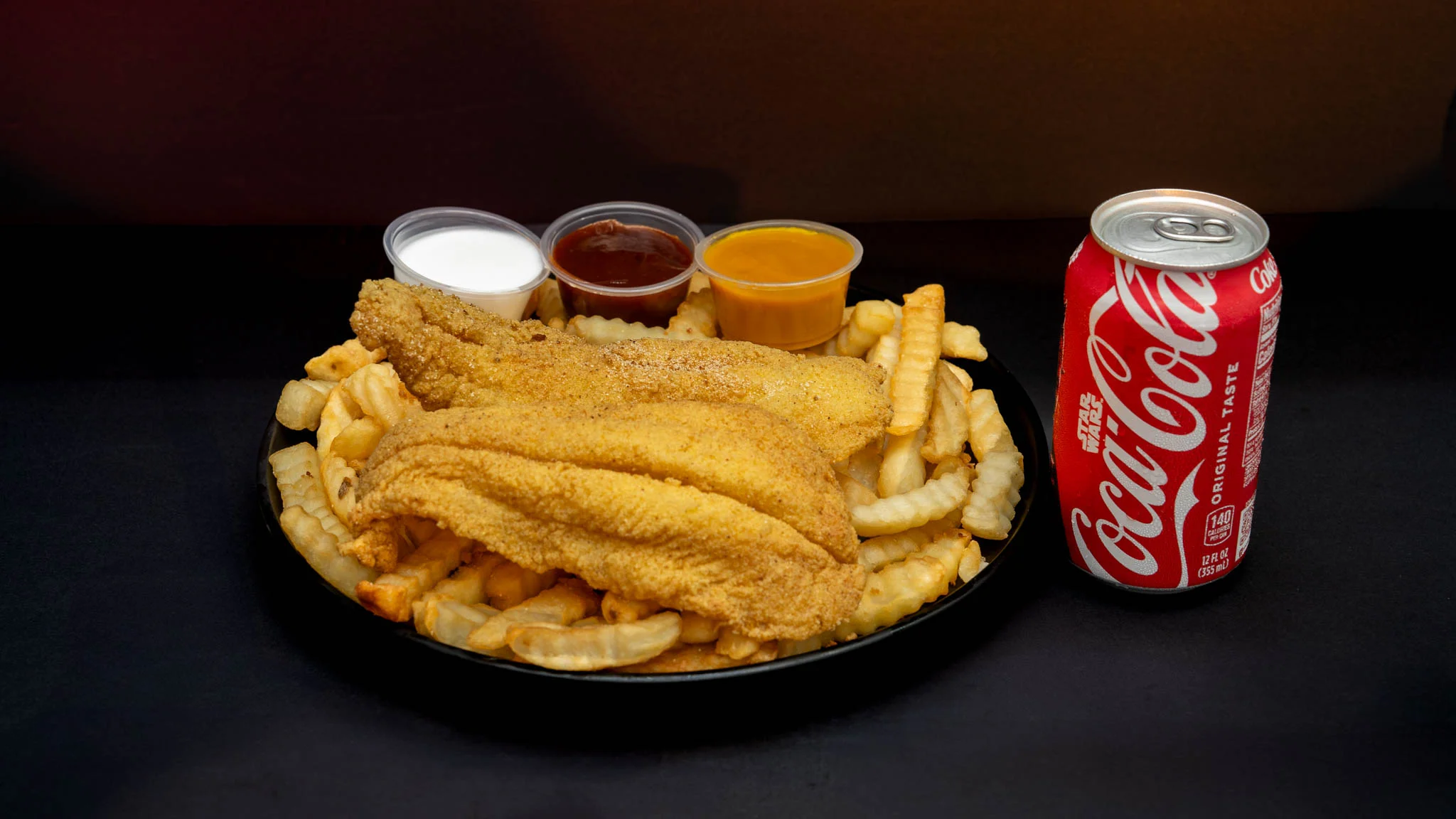 Southern fried catfish with crinkle-cut fries