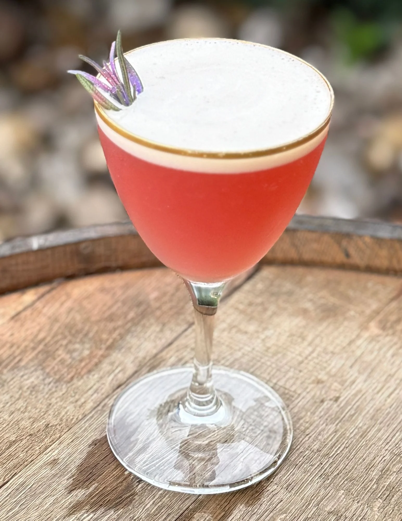 Apple martini cocktail garnished with a slice of apple