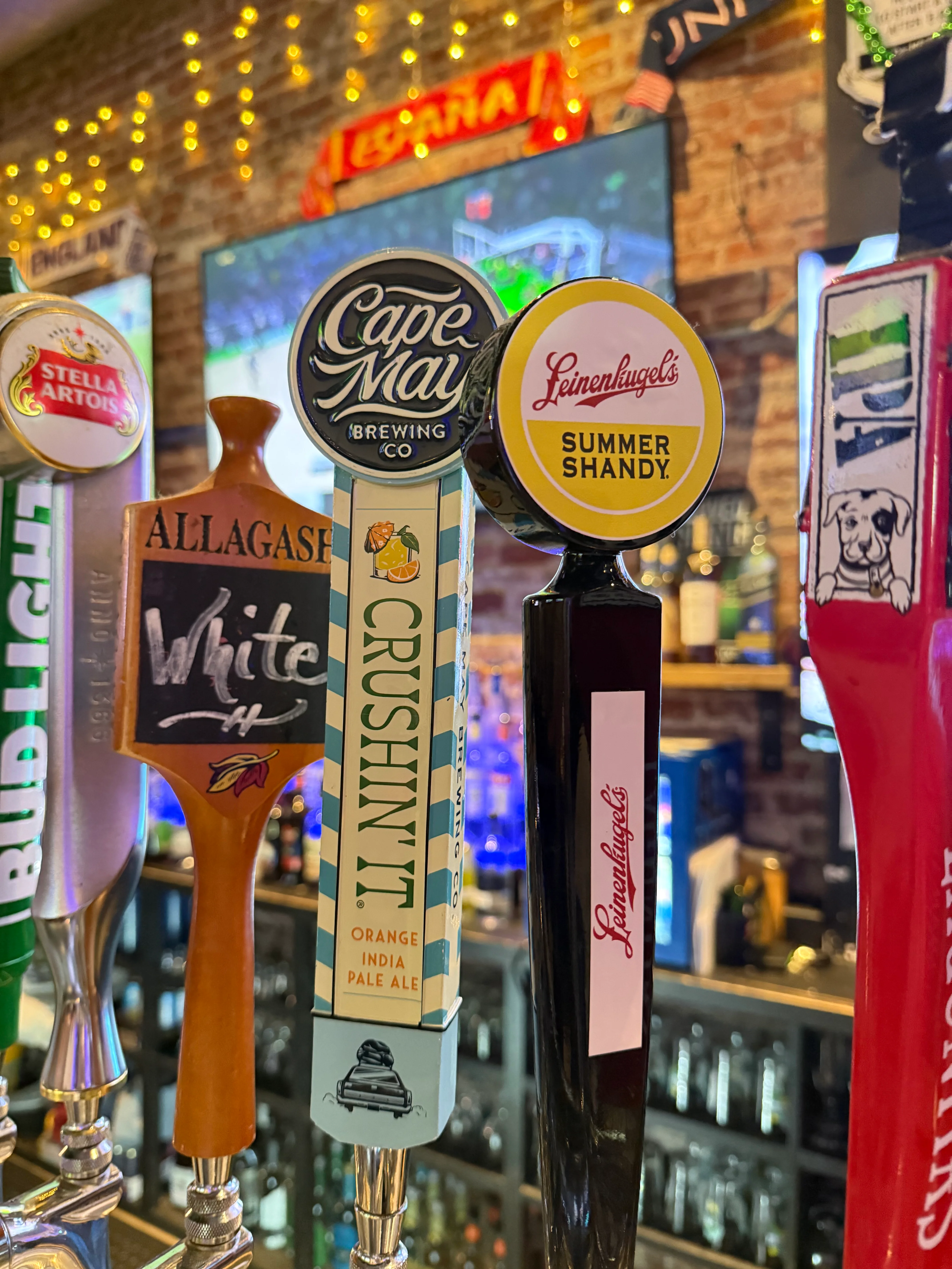 Craft beer taps featuring Cape May and Leinenkugel's Summer Shandy