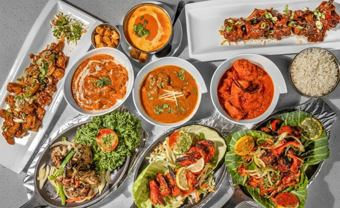 Assorted Indian curries and grilled dishes served on a platter