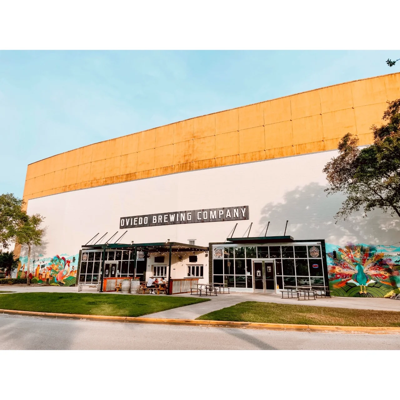 Exterior view of Oviedo Brewing Company with vibrant mural