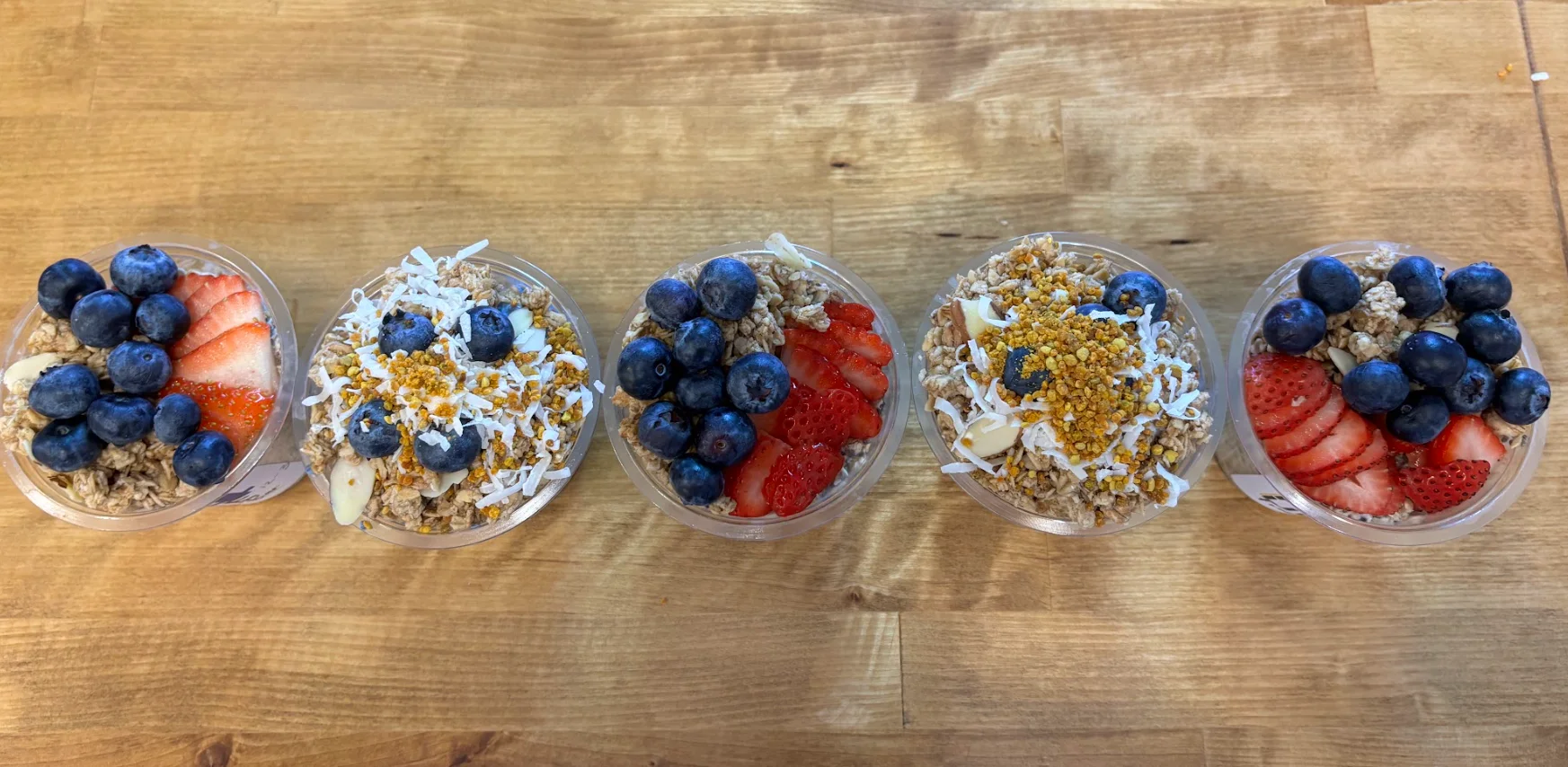 Colorful acai bowls topped with fresh fruits