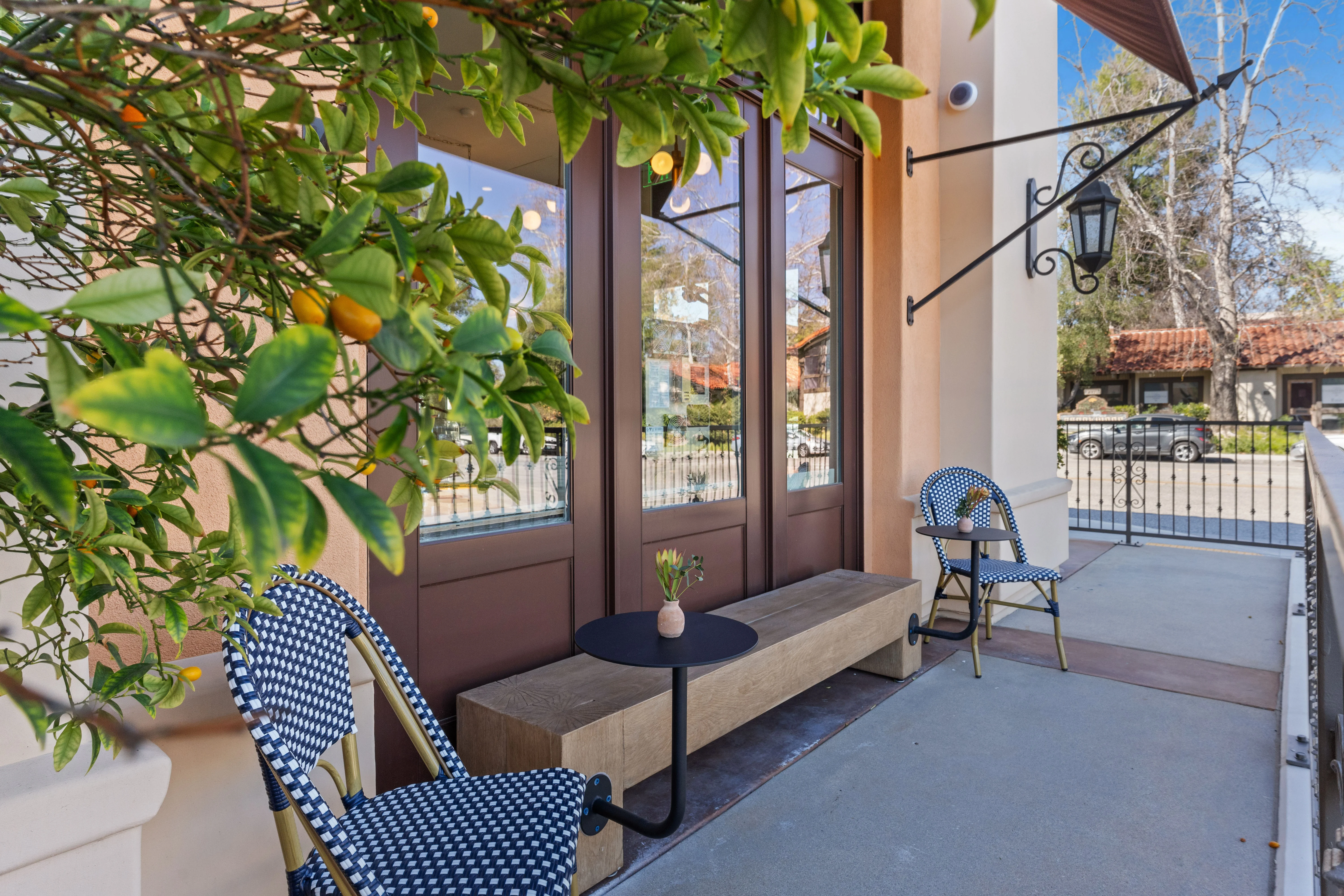 Charming restaurant entrance with outdoor seating