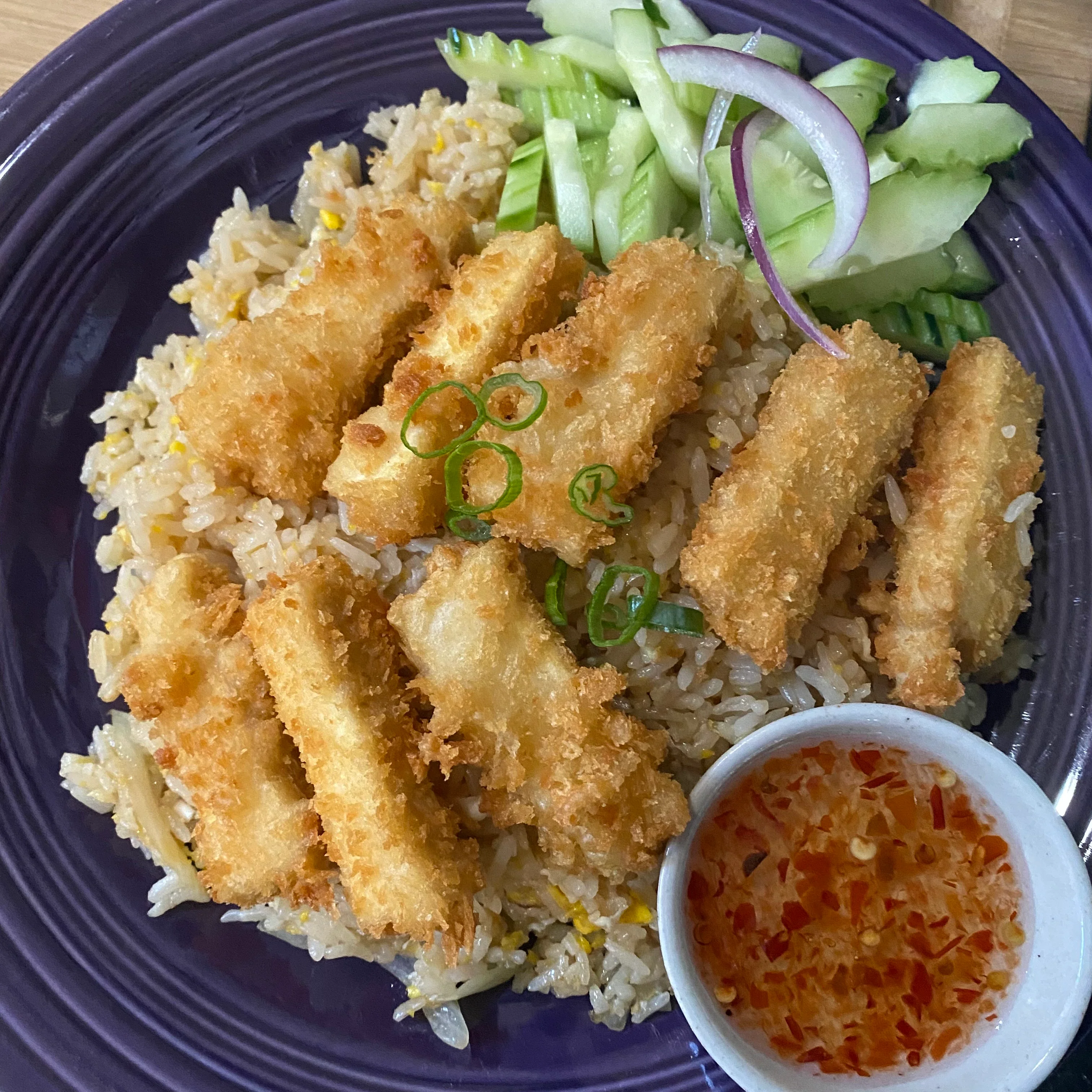 Crispy fish fillets with fried rice and chili sauce
