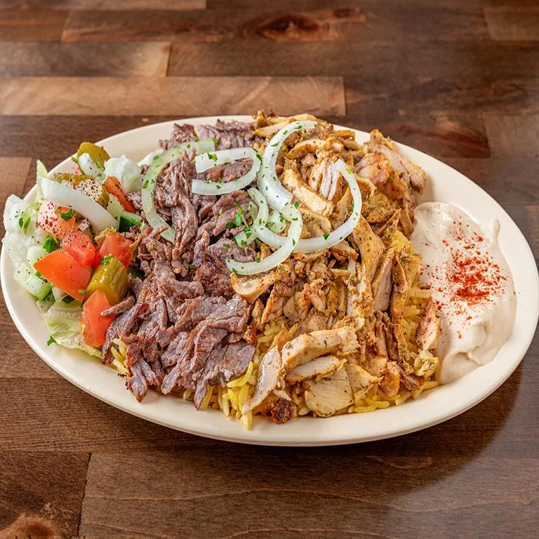 Pita Zone chicken and steak shawarma plate with hummus and salad