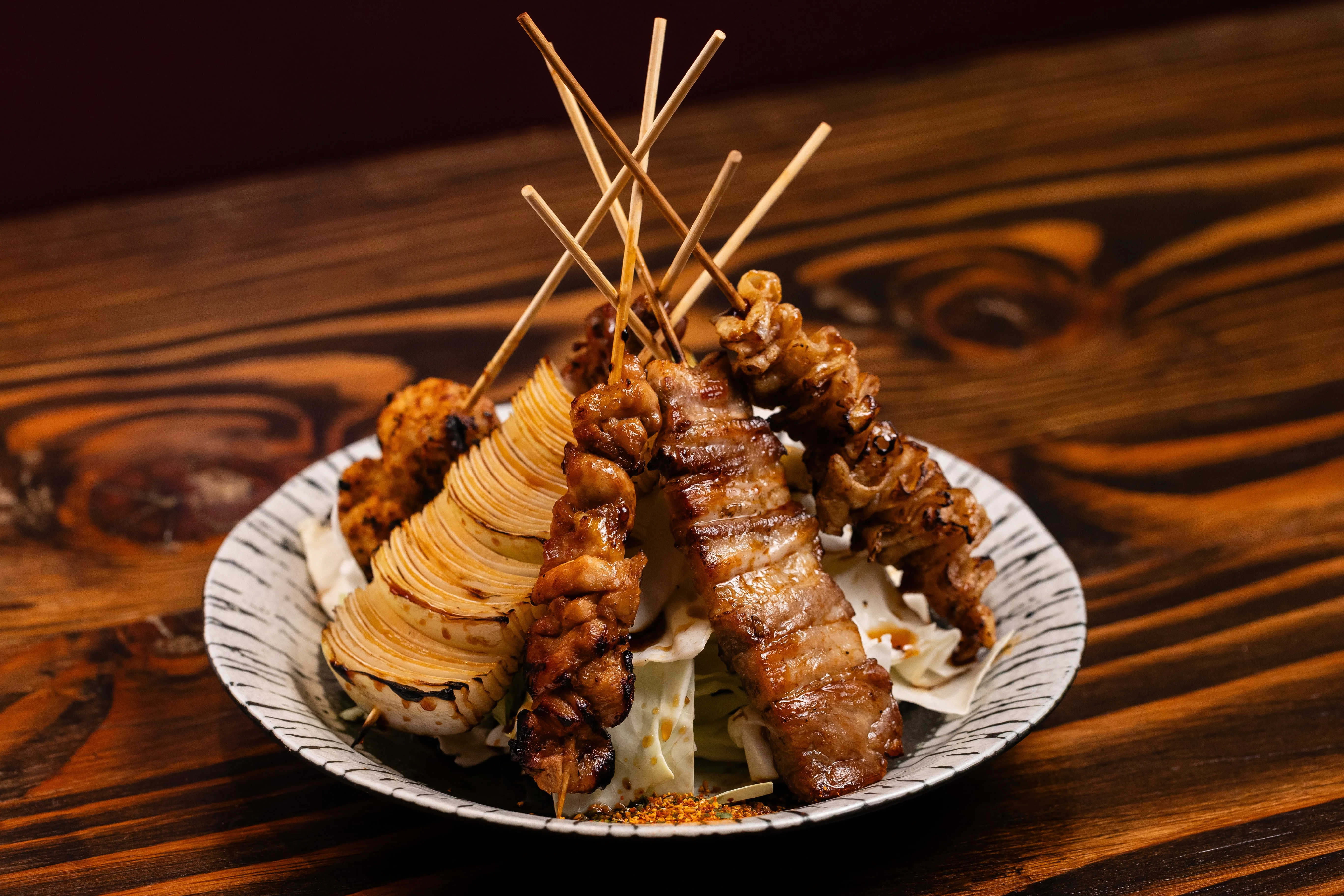 Japanese yakitori skewers with grilled chicken and vegetables