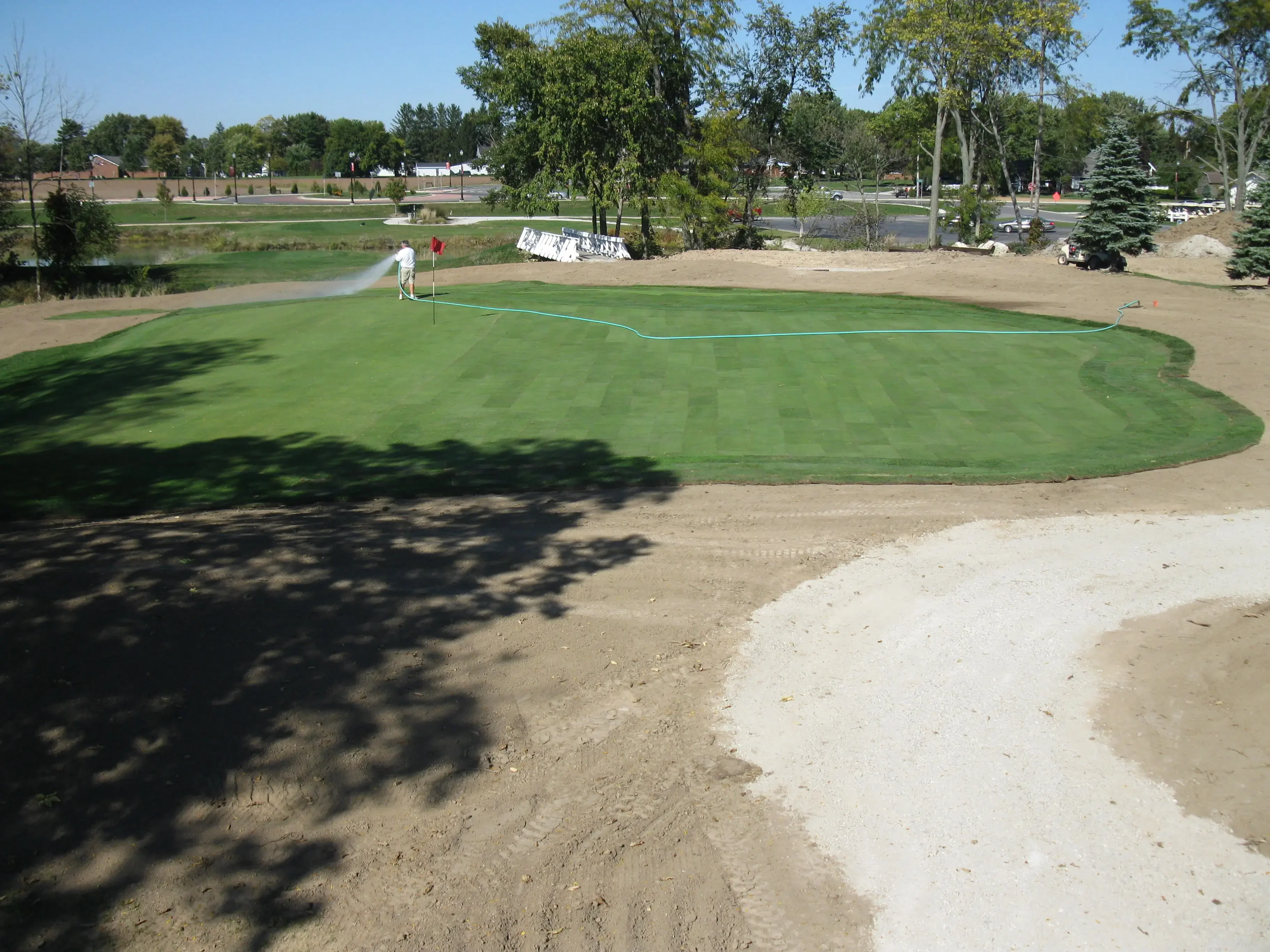 Golf course under maintenance with freshly laid sod