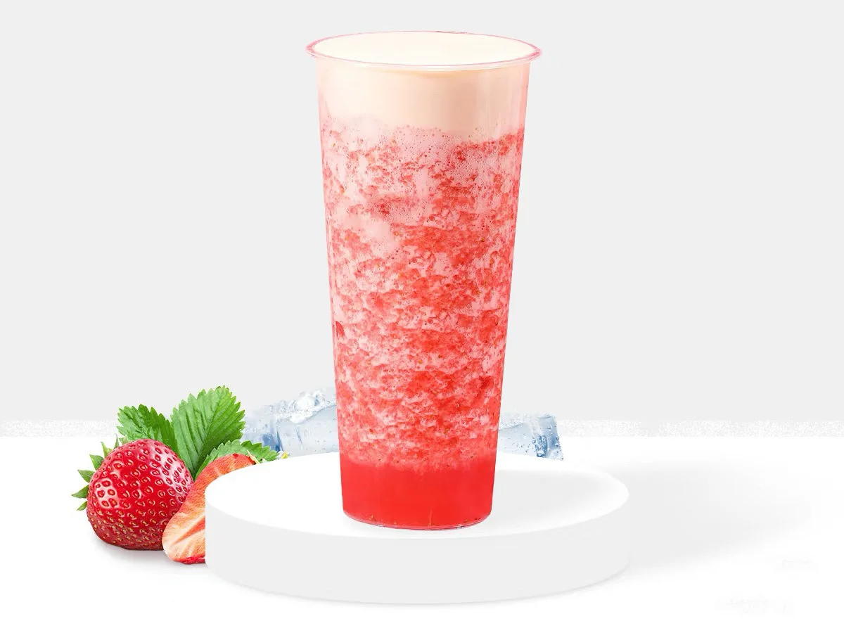 Refreshing strawberry slush drink in a tall cup