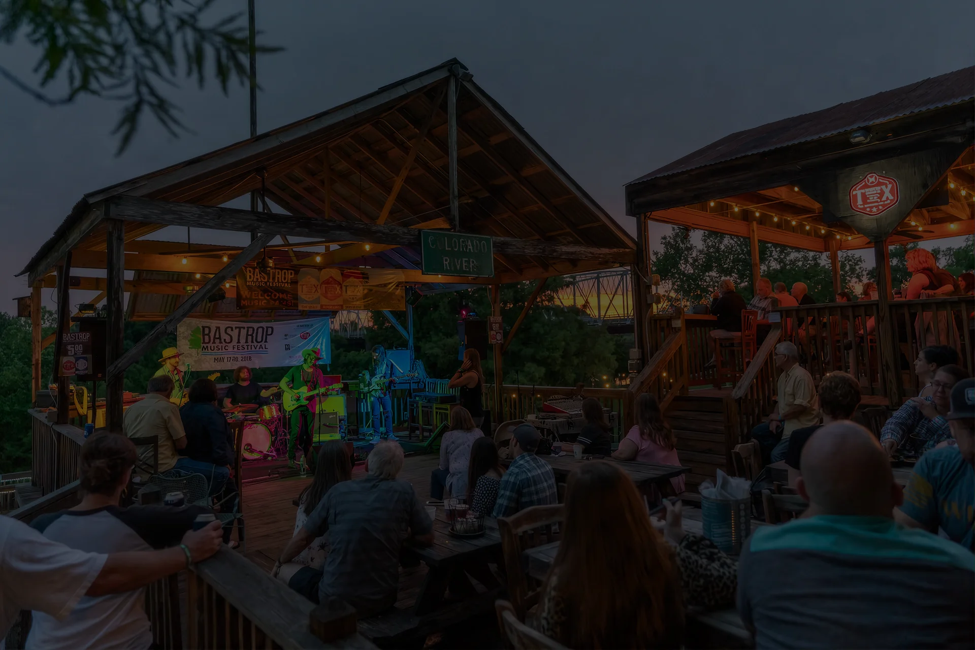 Live music performance at a vibrant outdoor restaurant