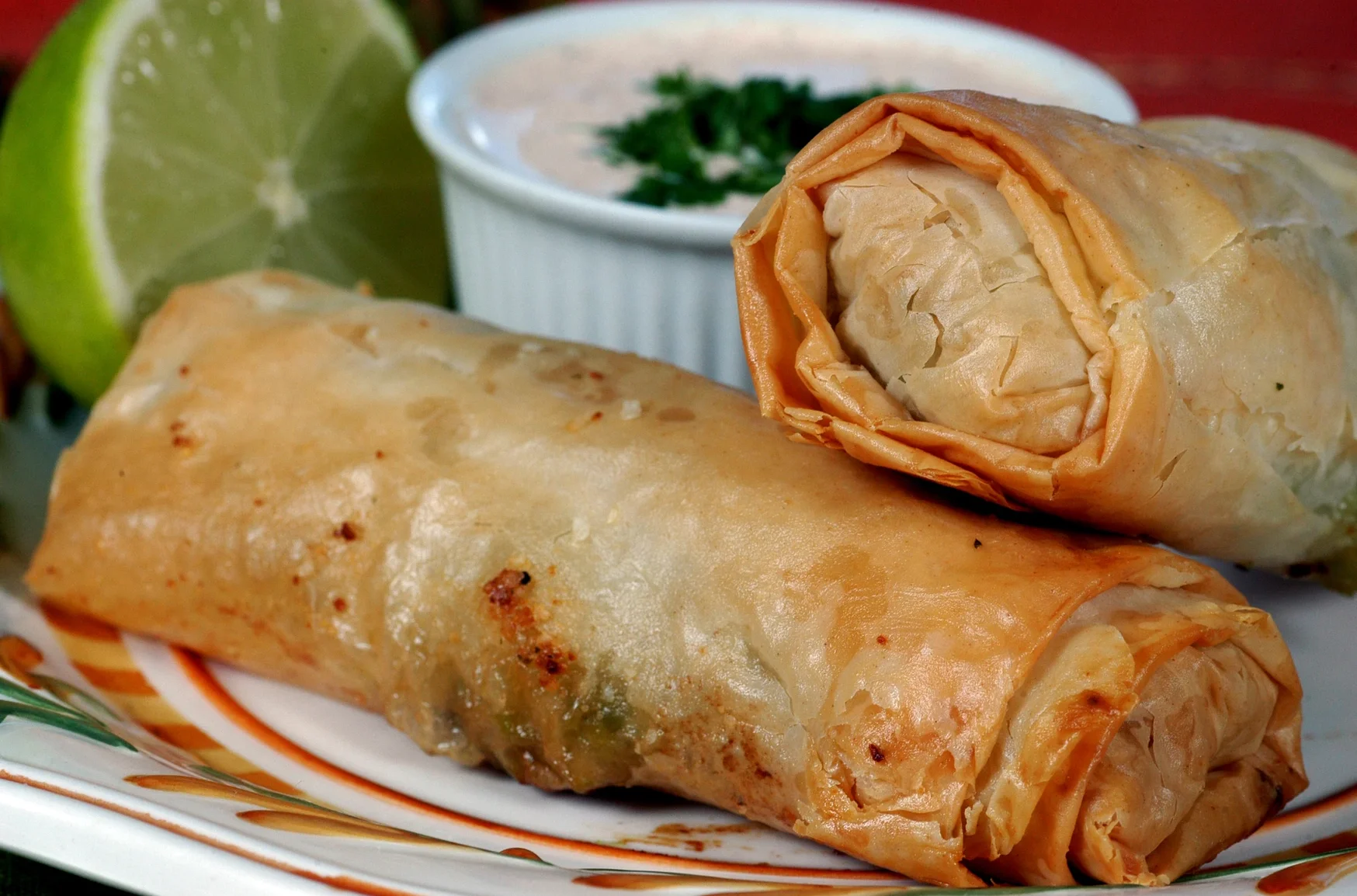 Crispy spring rolls served with dipping sauce