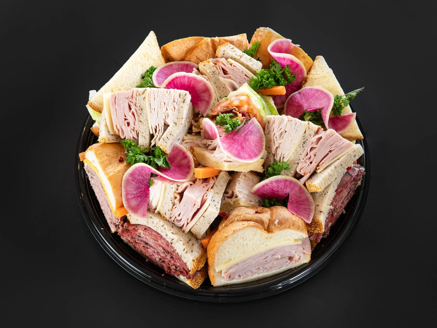 Chef cutting sandwich