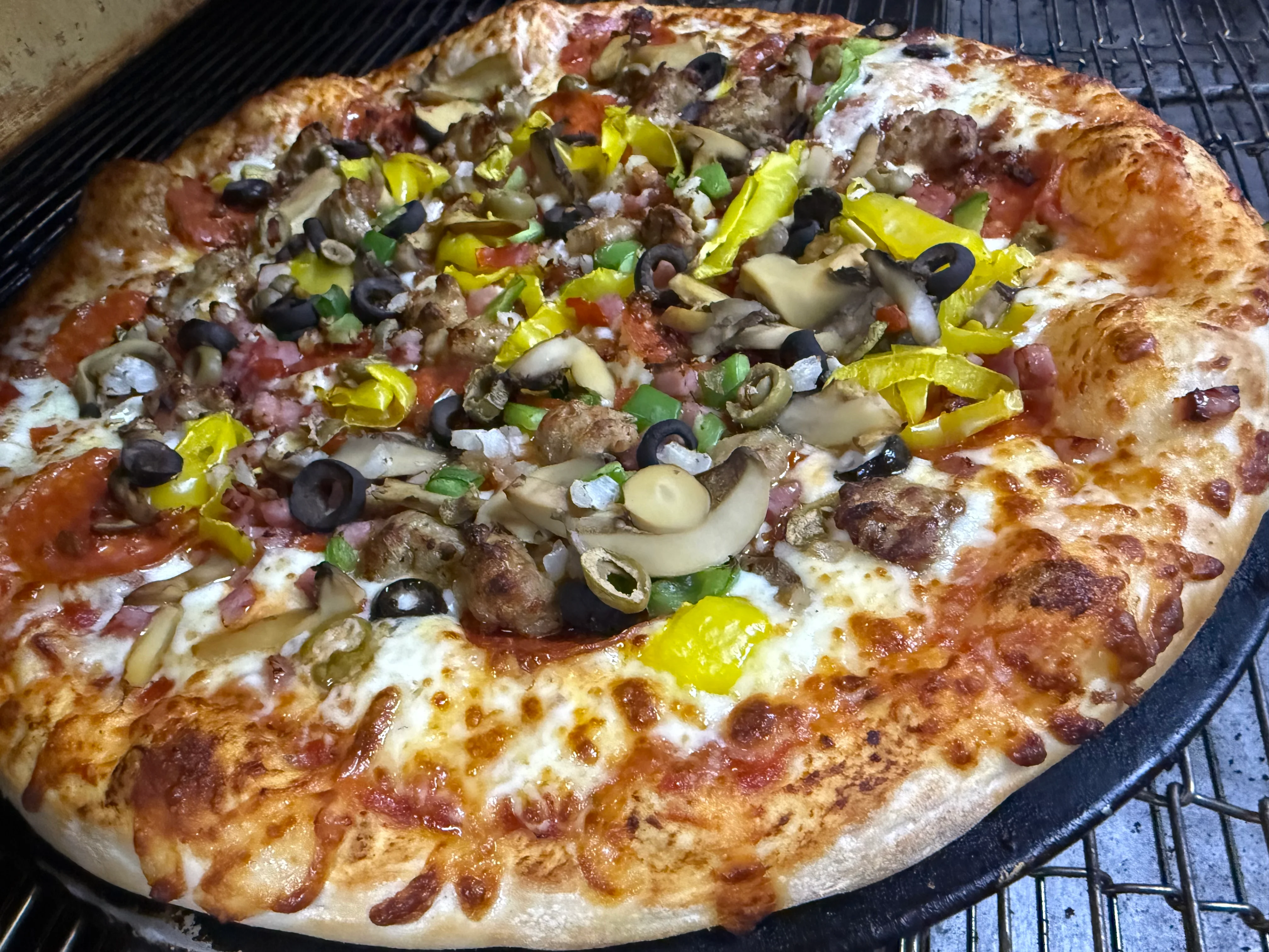 Loaded supreme pizza with various toppings