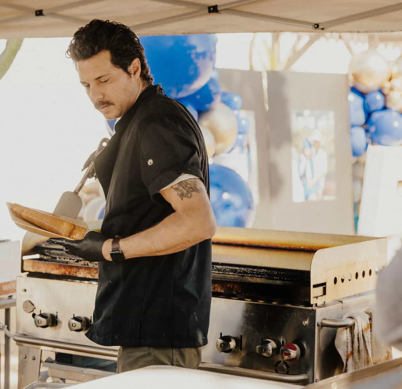 A restaurant chef preparing a dish