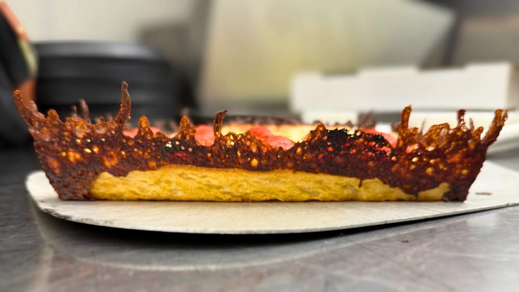 Crispy pizza crust with charred edges