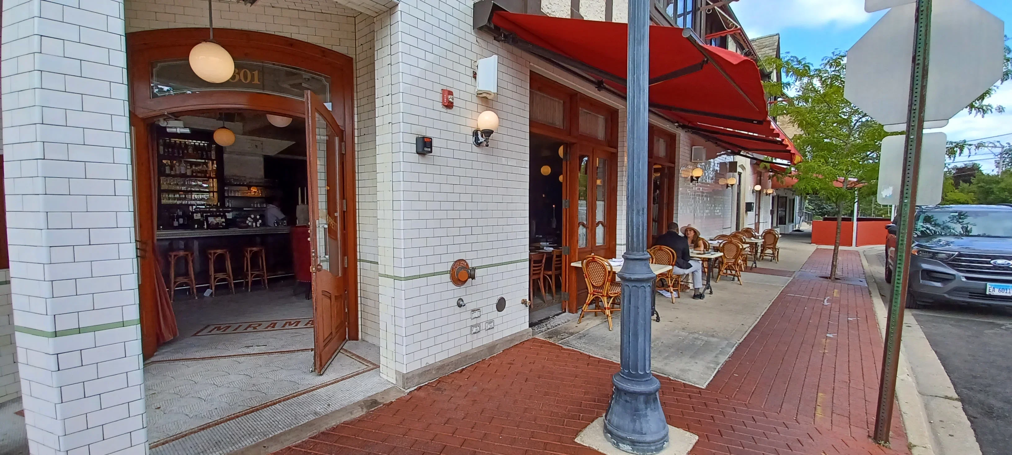 Charming restaurant exterior with outdoor seating and inviting ambiance
