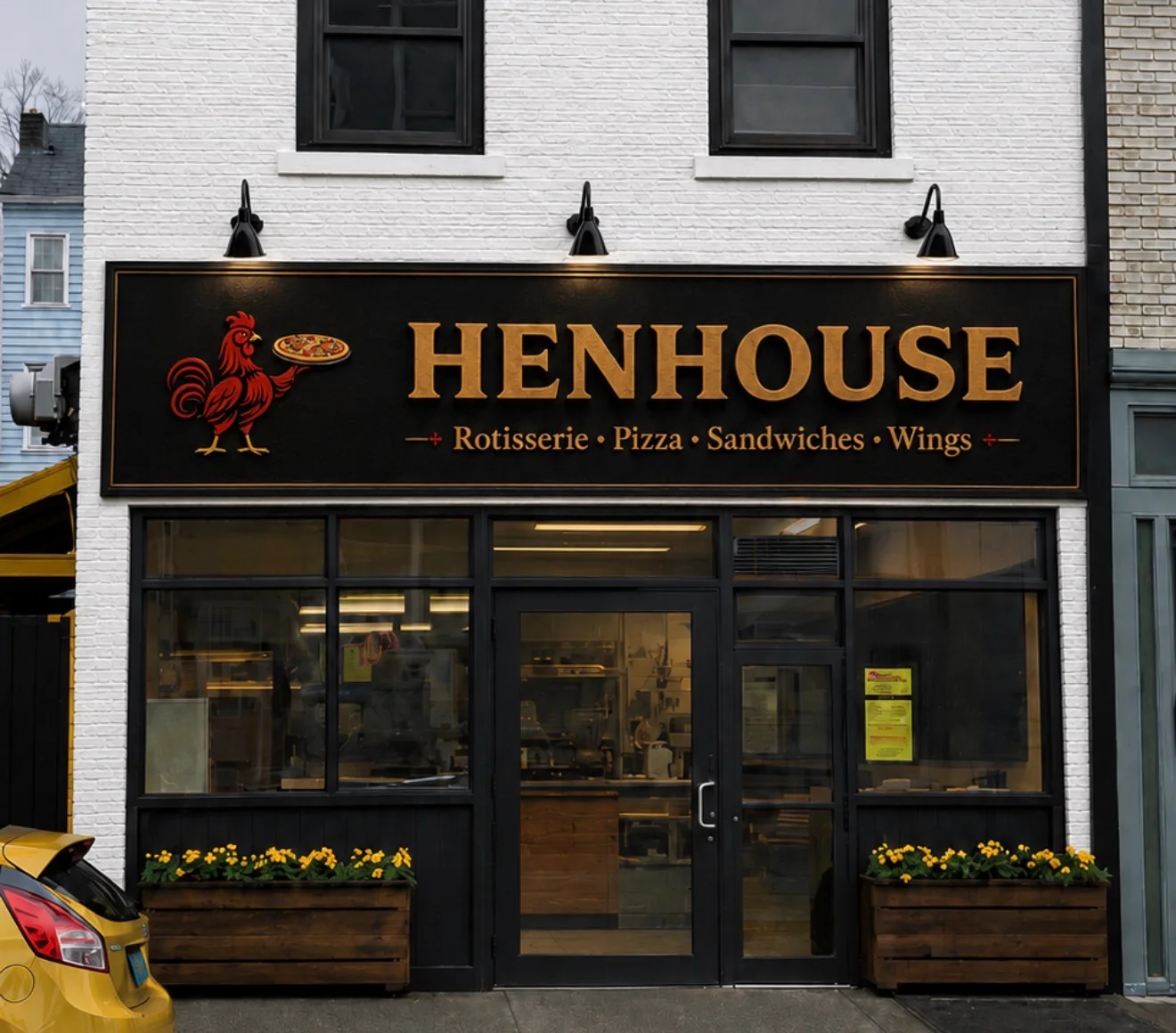 Charming restaurant exterior of Henhouse with rotisserie and pizza offerings