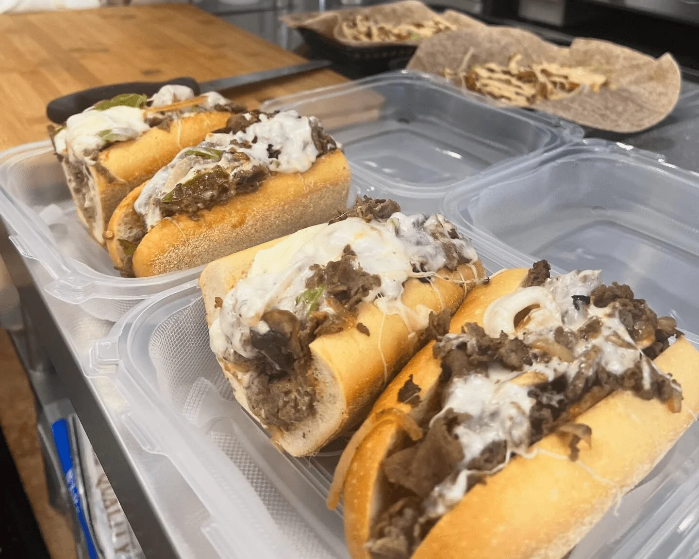 Philly cheesesteak sandwiches ready to serve