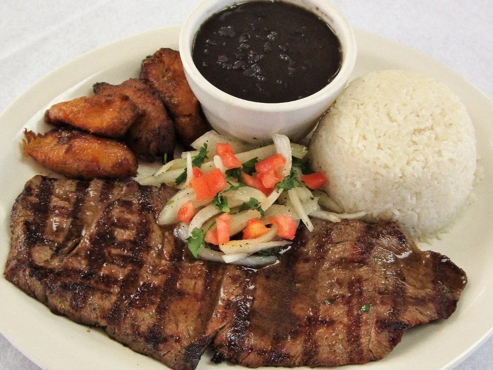 Combo #4 1/2lb. Grilled Steak with Rice, Beans, Plantains & Drink
