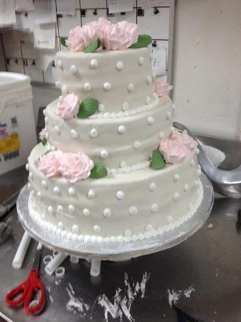 Wedding cake with pink sugar roses from The Kosher Pastry Oven