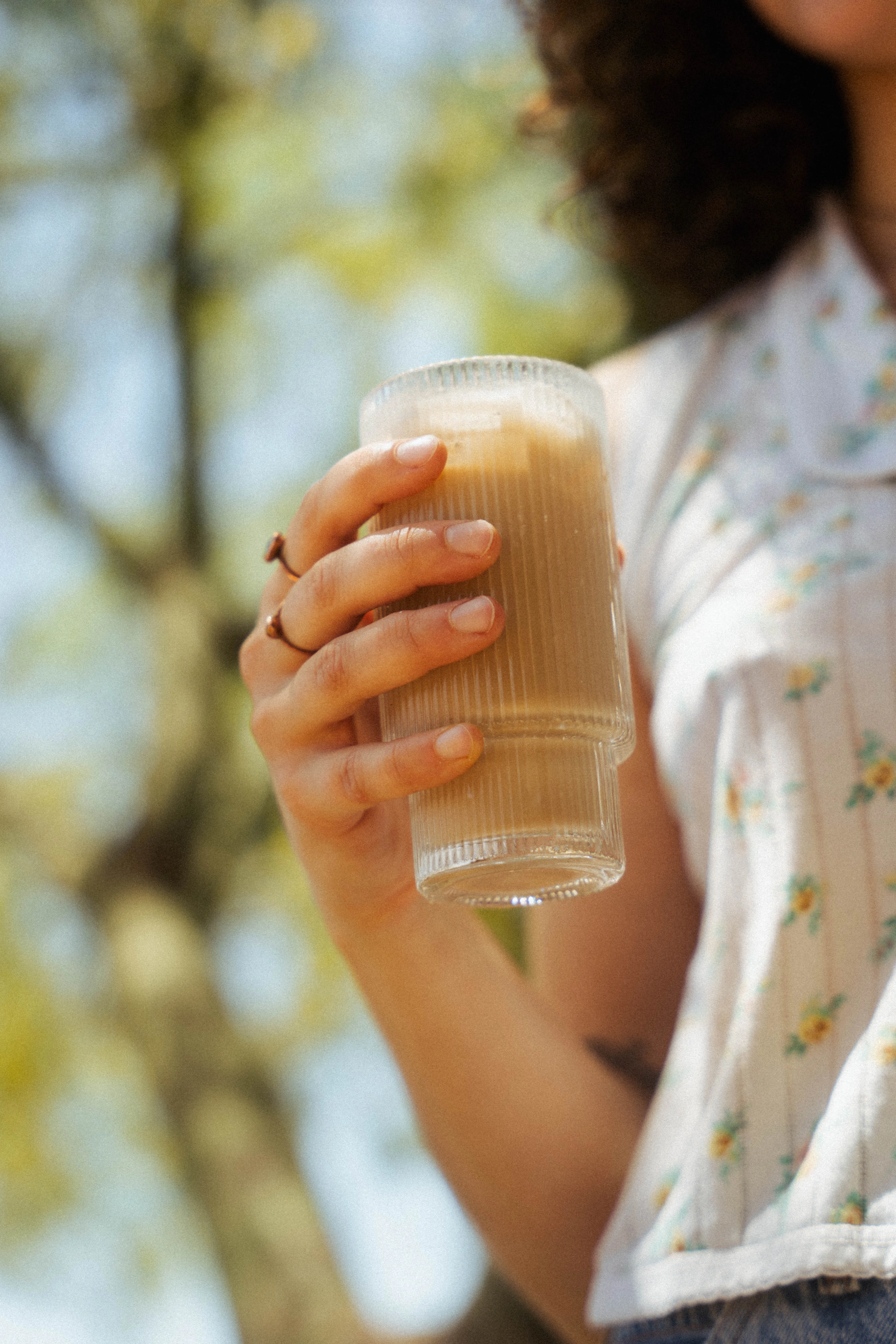 Refreshing iced coffee in a glass on a sunny day