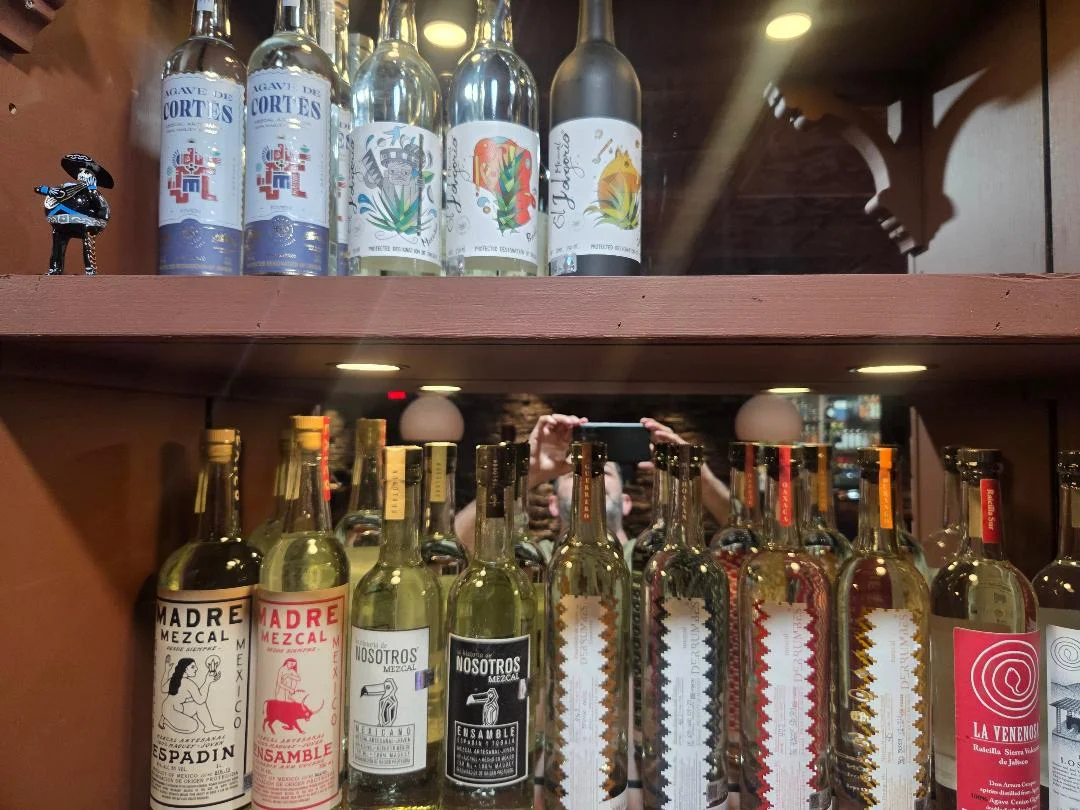 Selection of premium mezcal bottles on display
