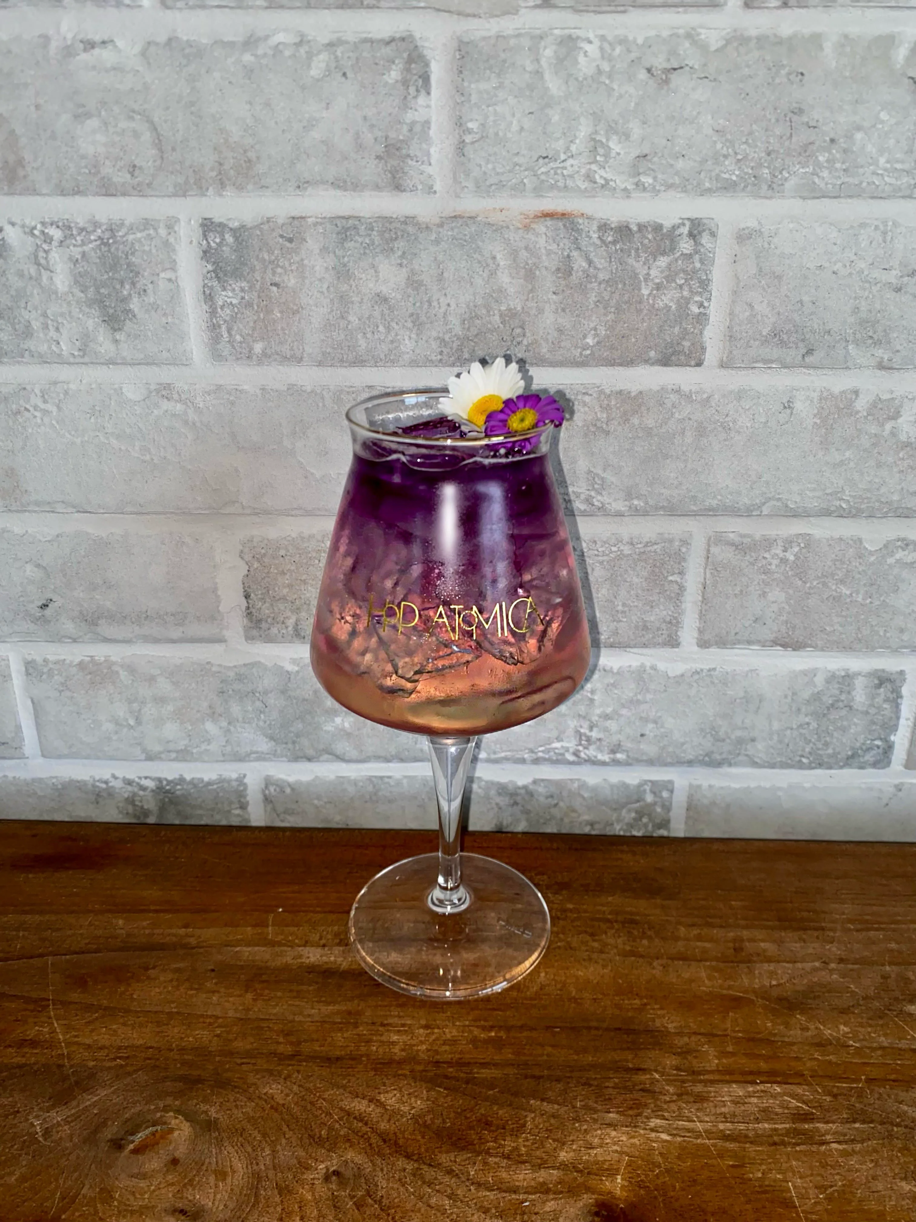 Colorful floral cocktail in a stylish glass