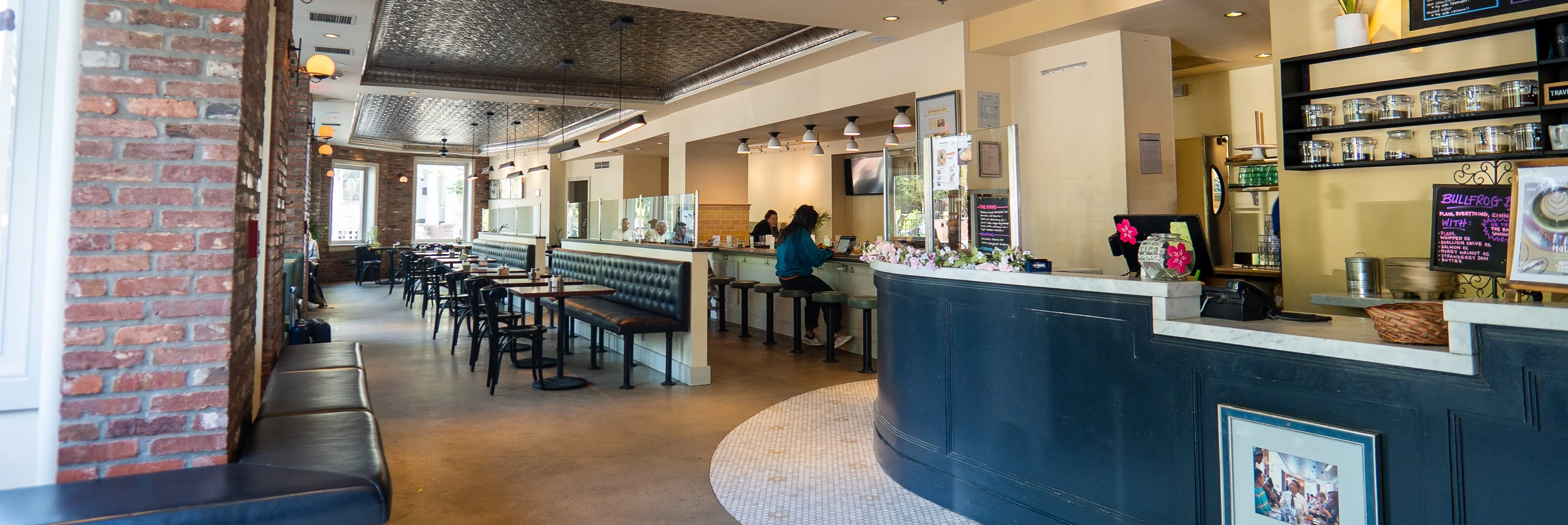 Cozy restaurant interior with modern decor and seating