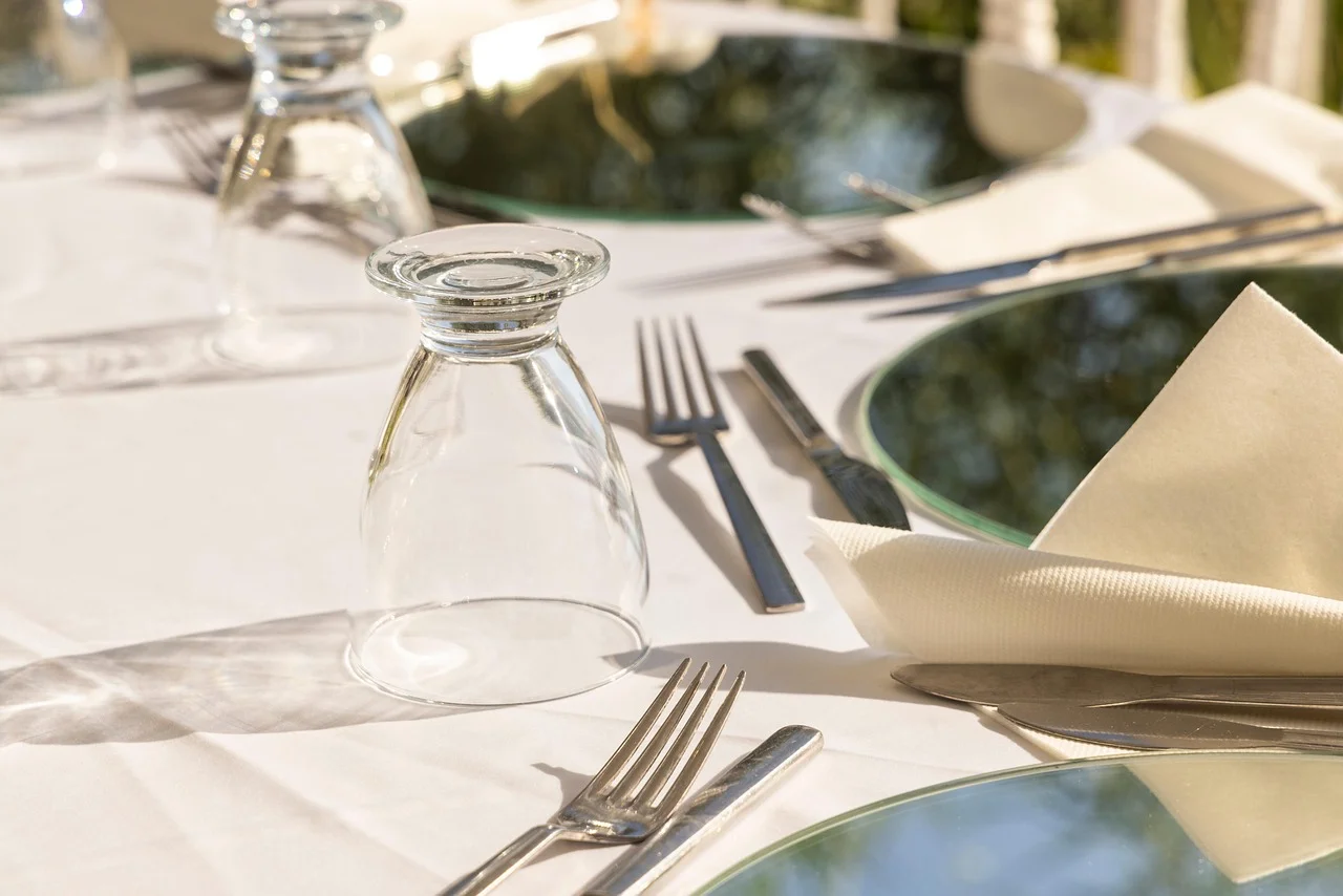Elegant dining table set with glassware and cutlery