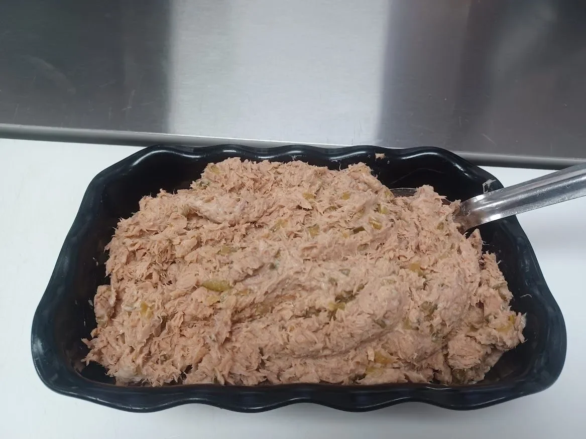 Classic tuna salad in a black serving dish