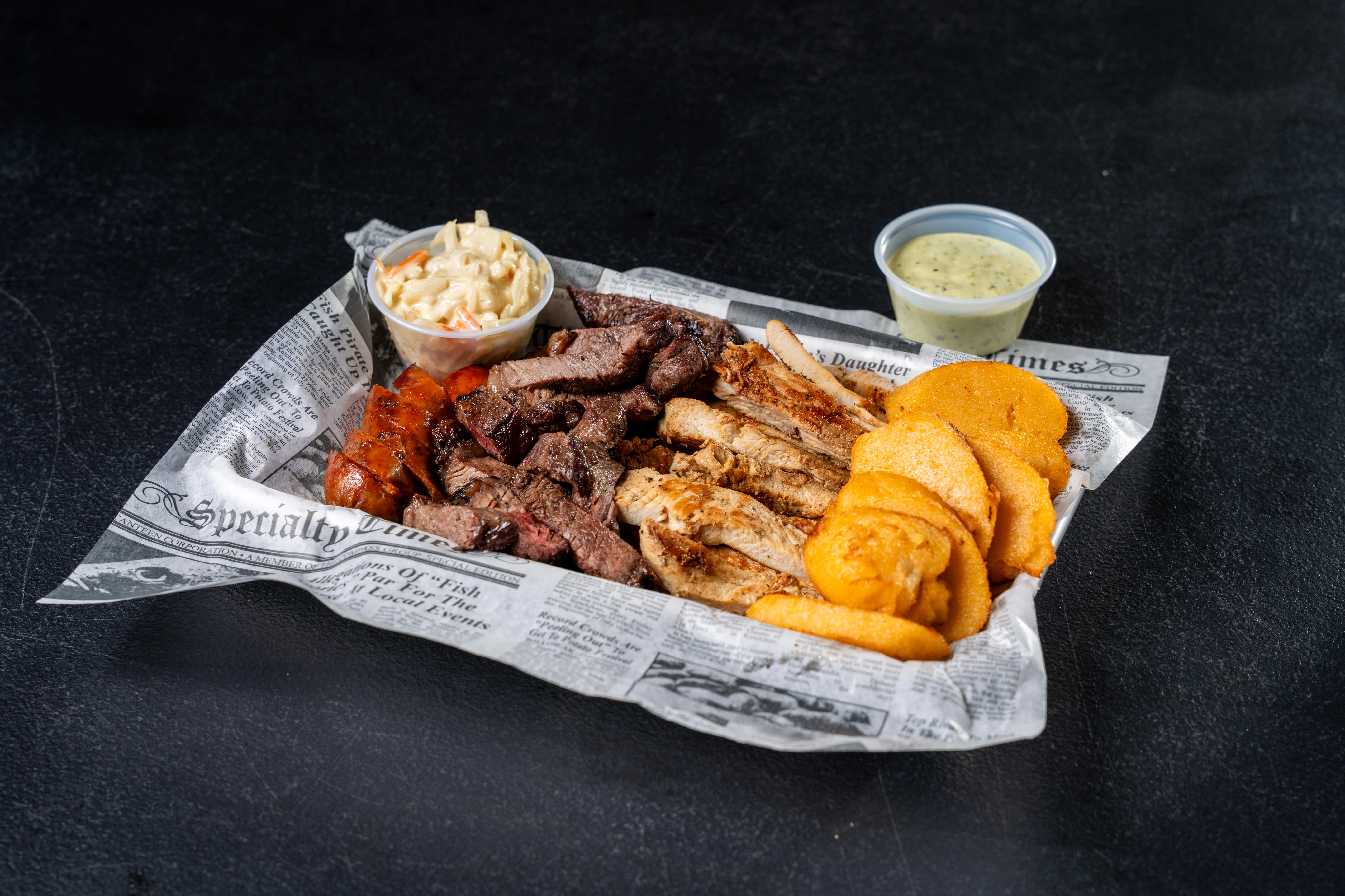 Assorted barbecue platter with meats and sides