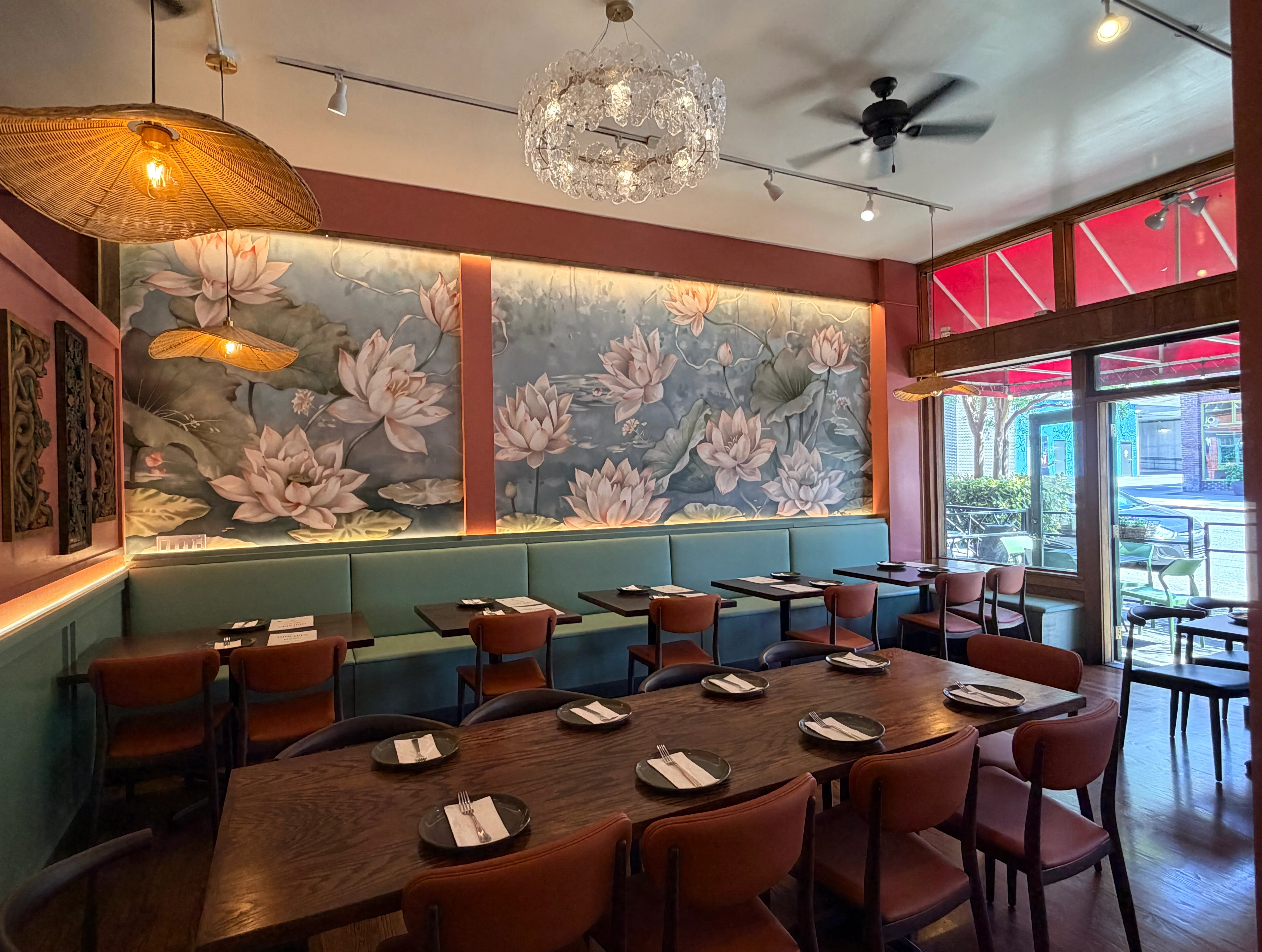 Cozy restaurant interior with Thai decor and warm lighting