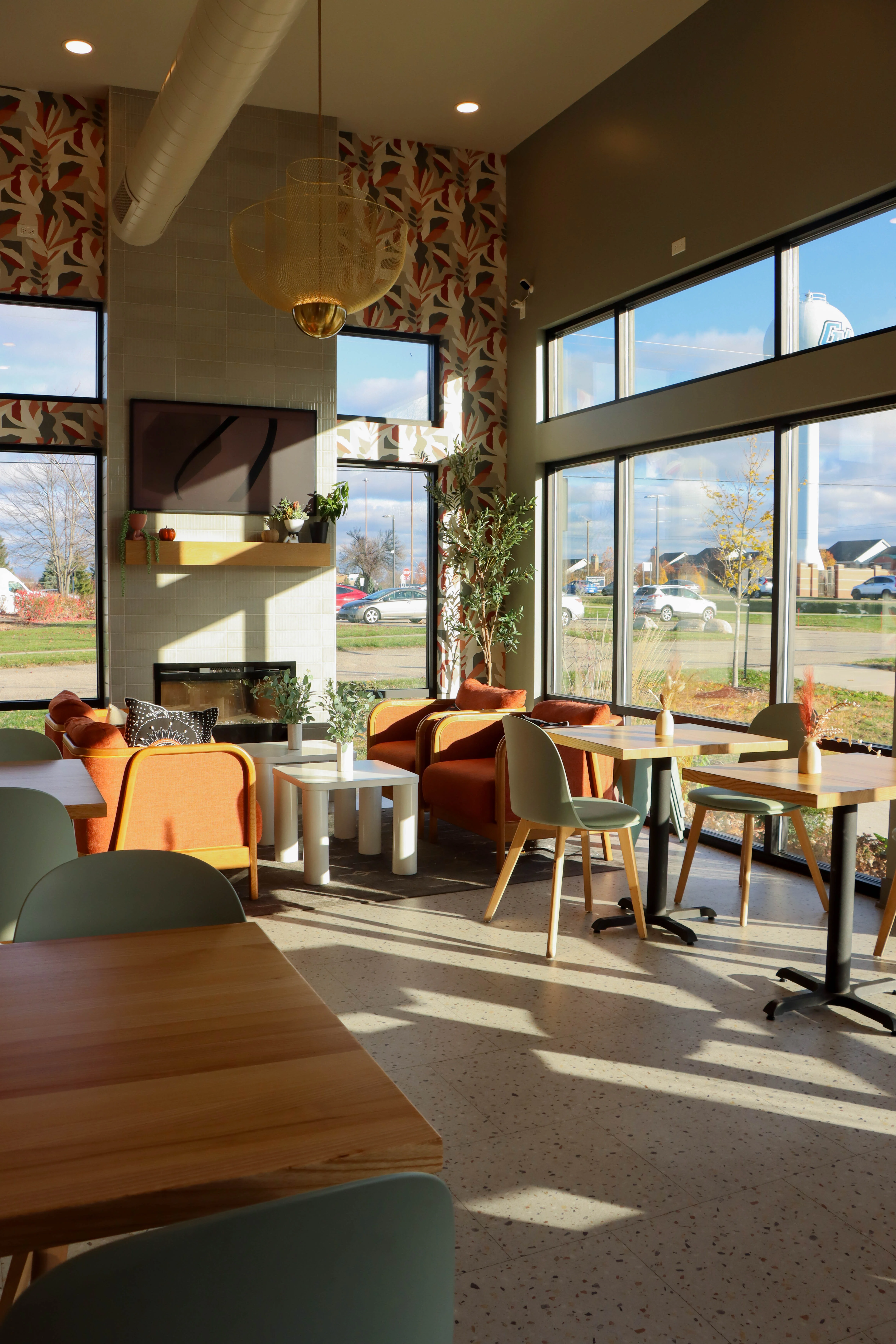 Sunsoaked view of the interior of a modern cafe