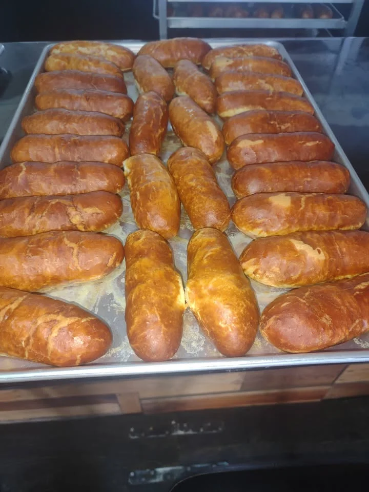 Freshly baked Brazilian pão de queijo on a tray