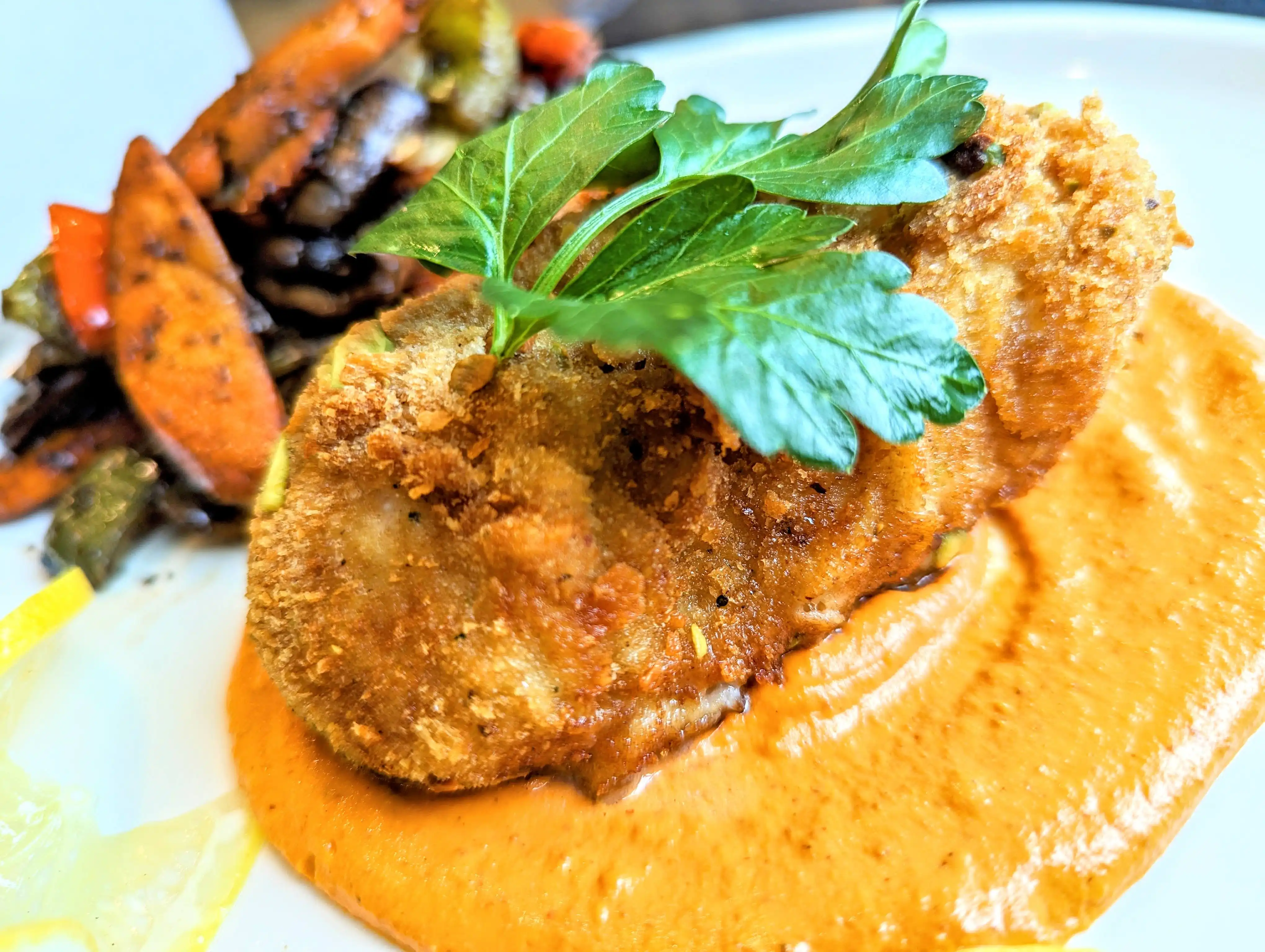 fried cod filet with romesco sauce